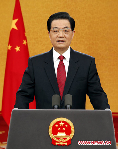 Chinese President Hu Jintao delivers a New Year's address via state broadcasters in Beijing, capital of China, Dec. 31, 2012. (Xinhua/Ju Peng)