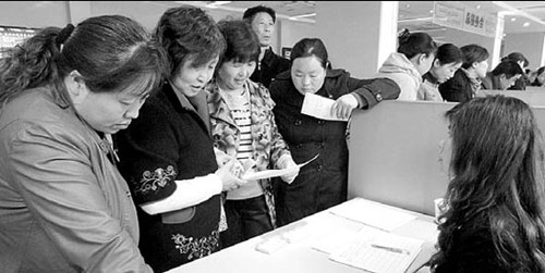 Domestic helpers look for openings at a recent job fair in Suzhou, Jiangsu province. The huge demand for domestic helpers has attracted many people to join the profession. [Photo by Wang Jiankang/ For China Daily]