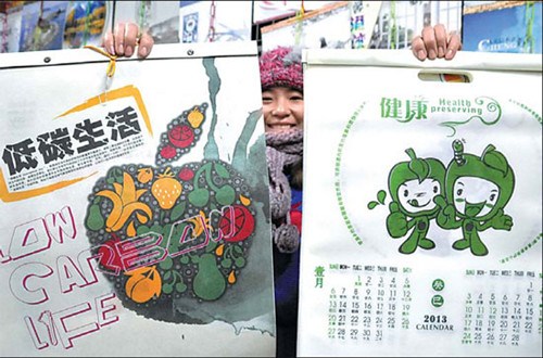 Personalized calendars are gaining popularity and are replacing traditional wall calendars. [Photo by Hao Qunying / For China Daily]