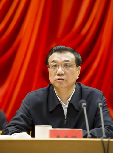 Li Keqiang, a member of the Standing Committee of the Political Bureau of the Communist Party of China (CPC) Central Committee, presides the opening ceremony of a high-profile workshop attended by new CPC Central Committee members and alternate members elected at the 18th CPC National Congress in November last year in Beijing, capital of China, Jan. 5, 2013. (Xinhua/Huang Jingwen)