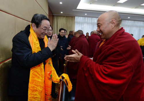 Yu Zhengsheng (L), a Standing Committee member of the Political Bureau of the Communist Party of China (CPC) Central Committee, attends a seminar held with Tibetan Buddhist representatives in Ganzi Tibetan Autonomous Prefecture, southwest China's Sichuan Province, Jan. 8, 2013. Yu made an inspection tour in Ganzi recently. (Xinhua/Ma Zhancheng)