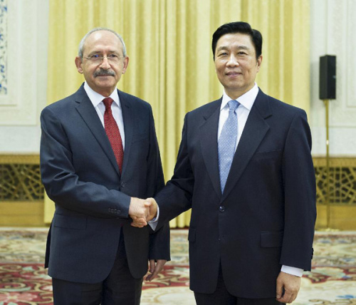   Li Yuanchao (R), a member of the Political Bureau of the Communist Party of China (CPC) Central Committee, meets with a delegation of Turkey's Republican People's Party headed by the party's chairman Kemal Kilicdaroglu (L), in Beijing, capital of China, Jan. 14, 2013. (Xinhua/Li Tao)