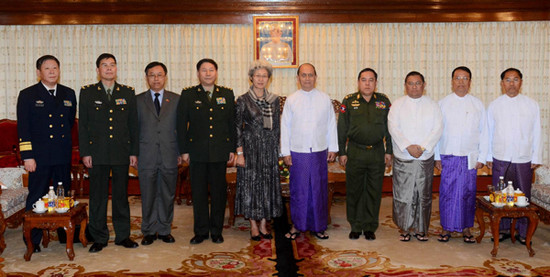 Representatives from both sides pose for group photos after the meeting between Myanmar President U Thein Sein and visiting Special Envoy of the Chinese Government Fu Ying in Yangon, Myanmar, Jan 19, 2013. Fu Ying, who is also Chinese vice foreign minister, arrived in Yangon on Saturday.[Photo/Xinhua]