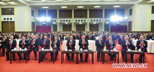 Chinese leaders Hu Jintao (C), Xi Jinping (5th R), Wu Bangguo (5th L), Wen Jiabao (4th R), Jia Qinglin (4th L), Li Keqiang (3rd R), Zhang Dejiang (3rd L), Yu Zhengsheng (2nd R), Liu Yunshan (2nd L), Wang Qishan (1st R) and Zhang Gaoli (1st L) attend a Spring Festival reception held by the Central Committee of the Communist Party of China and the State Council (Cabinet) at the Great Hall of the People in Beijing, capital of China, Feb. 8, 2013. (Xinhua/Li Tao)