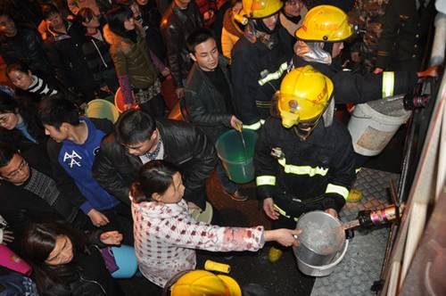 by a local tap water company was polluted. Water supplies resumed on Tuesday amid improving water quality. [Liu Desheng / for China Daily]