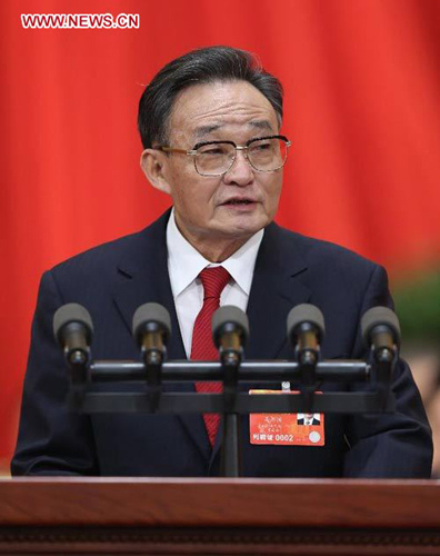 Wu Bangguo delivers a work report of the Standing Committee of the National People's Congress (NPC) during the second plenary meeting of the first session of the 12th NPC at the Great Hall of the People in Beijing, capital of China, March 8, 2013. (Xinhua/Pang Xinglei)