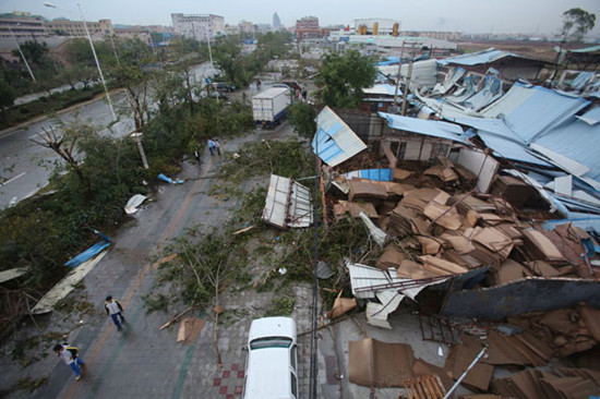 The scattered debris of a factory shows the severity of a storm that swept through Shatian township in Dongguan, Guangdong province, on Wednesday. Provided to China Daily