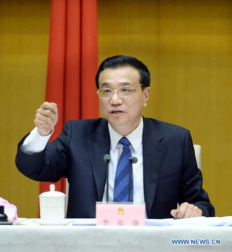 Chinese Premier Li Keqiang presides over the first plenary meeting of the newly-elected State Council, China's cabinet, in Beijing, capital of China, March 20, 2013. (Xinhua/Li Tao)