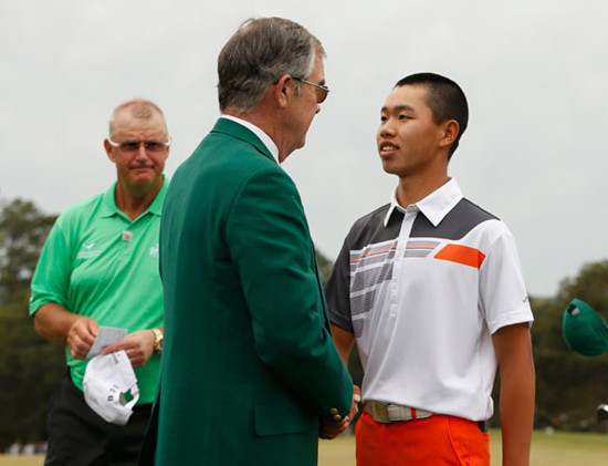 Guan with Chairman Billy Payne (center) and former US Masters champion Sandy Lyle after finishing his final round at the 2013 tournament in Augusta, Georgia. Mark Blinch / Reuters