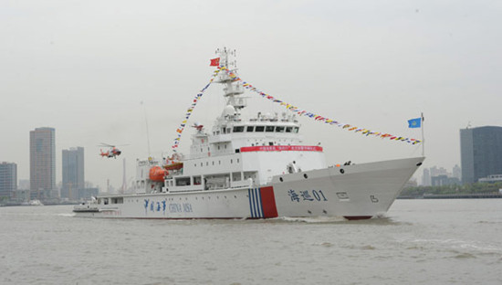 China's largest patrol and rescue ship Haixun 01 is officially put into use on Tuesday morning in Shanghai. [Photo/Xinhua]