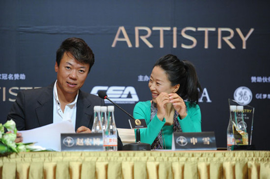 Shen Xue (right) and Zhao Hongbo at the media conference to launch Artistry On Ice 2013 on Wednesday in Beijing. provided to China Daily