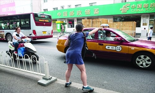 Taxi drivers who refuse to stop for passengers while on duty could be blacklisted as part of sweeping changes poised to take effect over the next two years. Photo: Li Hao/GT