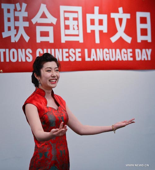 Singer Pang Yixuan sings the Dragon Boat Song during an event to celebrate the United Nations Chinese Language Day, at UN Plaza in New York, on April 19, 2013. (Xinhua/Niu Xiaolei)