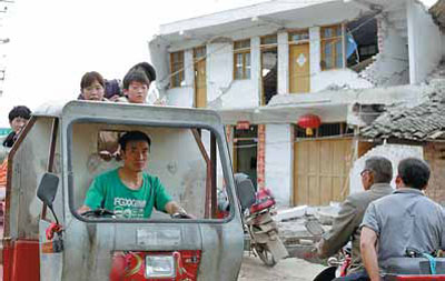 Wuxing residents start a cleanup operation before any rescue teams arrive.