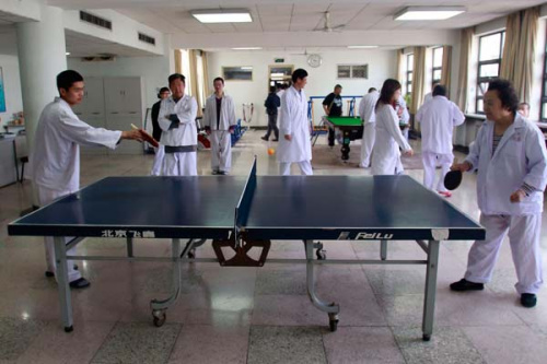 Table tennis is a favorite recreational activity for mental health patients at Anding Hospital in Beijing. Feng Yongbin / China Daily 