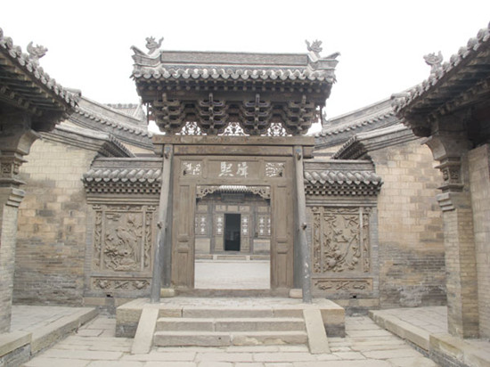 The 1,000-house Chang Family Manor is a witness to the family's past glory and a showcase of traditional architecture and artworks of brick sculptures. Li Yang / China Daily