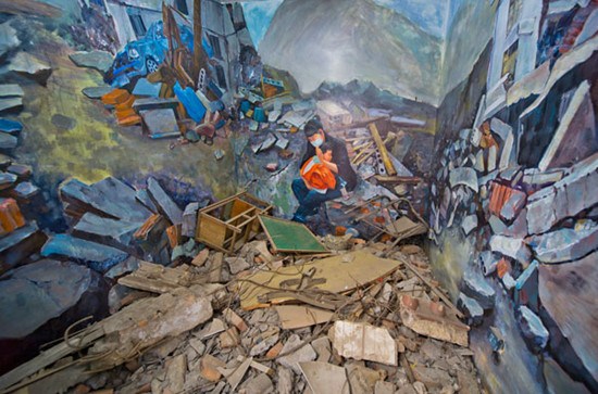 Paintings and rubble from the Wenchuan earthquake are displayed. Provided to China Daily