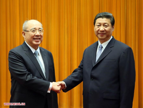 The Communist Party of China (CPC) Central Committee General Secretary Xi Jinping (R) meets with Wu Poh-Hsiung, honorary chairman of the Kuomintang (KMT) Party, in Beijing, capital of China, June 13, 2013. (Xinhua/Lan Hongguang)