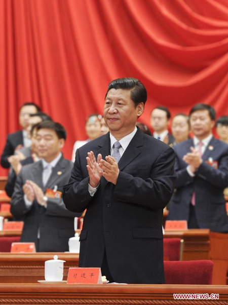 Chinese President Xi Jinping (front), also general secretary of the Central Committee of the Communist Party of China (CPC) and chairman of the Central Military Commission (CMC), applauds while attending the opening ceremony of the 17th national congress of the Communist Youth League of China (CYLC), in Beijing, capital of China, June 17, 2013. (Xinhua/Zhang Duo) 