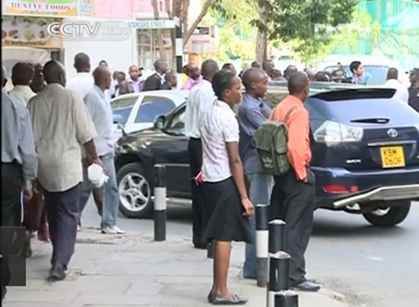 Video grab from CCTV news shows people get together around the shooting spot in Kenyas capital of Nairobi.