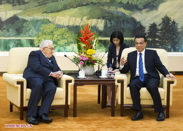 Chinese Premier Li Keqiang (R) meets with former U.S. Secretary of State Henry Kissinger at the Great Hall of the People in Beijing, capital of China, June 28, 2013. [Photo/Xinhua]