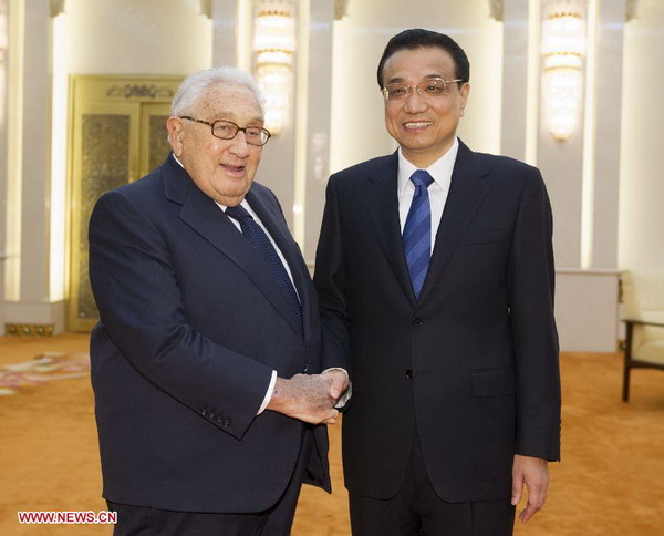 Chinese Premier Li Keqiang (R) meets with former U.S. Secretary of State Henry Kissinger at the Great Hall of the People in Beijing, capital of China, June 28, 2013. [Photo/Xinhua]