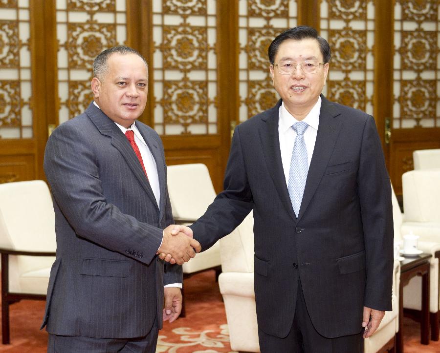 Zhang Dejiang (R), chairman of the Standing Committee of the National People's Congress (NPC) of China, meets with Venezuelan National Assembly President Diosdado Cabello in Beijing, capital of China, July 8, 2013. (Xinhua/Huang Jingwen)