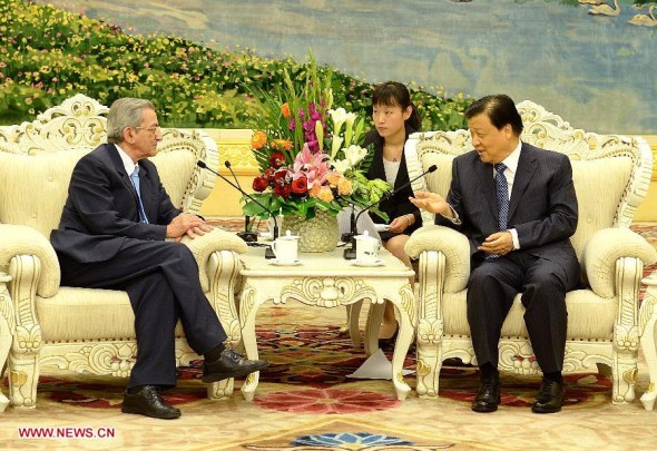 Liu Yunshan (R), a member of the Standing Committee of the Political Bureau of the Communist Party of China (CPC) Central Committee, meets with Jose Ramon Balaguer, head of the International Department of the Communist Party of Cuba, in Beijing, capital of China, July 24, 2013. (Xinhua/Liu Jiansheng) 