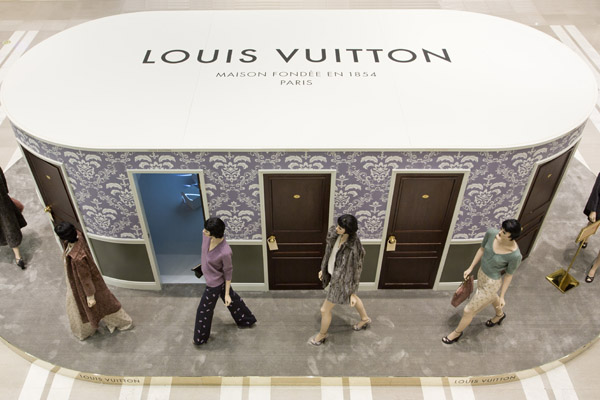 An installation outside the store recreates the look of Louis Vuitton's Fall/Winter 2013 runway show in Paris.Provided to China Daily