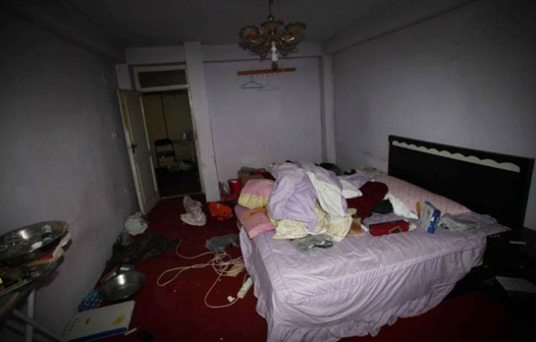 The room where three Chinese and an Afghan were killed Thursday by unknown armed people is seen in Kabul, Afghanistan, on Aug 9, 2013. [Photo/Xinhua]