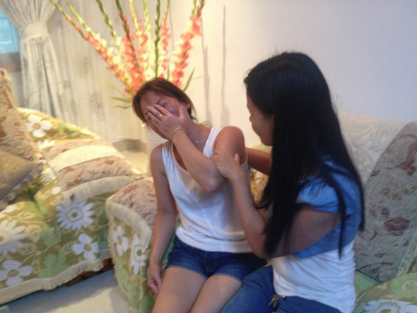 A mother is overcome with emotion after her 7-year-old daughter was sexually assaulted by a middle school student in Hengyang, Hunan province, on June 27. PROVIDED TO CHINA DAILY