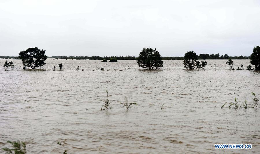 Floods, typhoon leave 105 dead, 115 missing in China