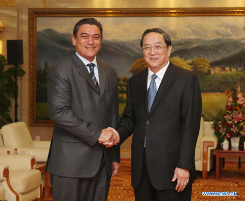 Yu Zhengsheng (R), chairman of the National Committee of the Chinese People's Political Consultative Conference (CPPCC), meets with Prime Minister of Vanuatu Moana Carcasses Kalosil in Yinchuan, capital of northwest China's Ningxia Hui Autonomous Region, Sept. 14, 2013. Kalosil is in Yinchuan to attend the first China-Arab State Expo which will kick off on Sunday. (Xinhua/Liu Weibing)