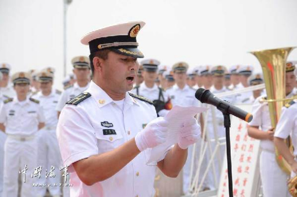 The photo features the scene of the naming and flag-presenting ceremony. The officers and men of a speedboat flotilla under the South China Sea Fleet of the Navy of the Chinese Peoples Liberation Army (PLAN) held a naming and flag-presenting ceremony for the new-type minesweeping ship Heshan on the morning of October 10, 2013 at a military port in Jiangmen city of south Chinas Guangdong province, marking that another new-type minesweeping ship is officially commissioned to the PLAN. (Chinamil.com.cn/ Liu Xin and Gao Yi) 