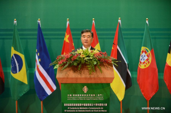 Chinese Vice Premier Wang Yang addresses the opening ceremony of the 4th Ministerial Conference of the Forum for Economic and Trade Cooperation between China and Portuguese-speaking countries, an inter-governmental multilateral cooperation mechanism, in Macao, Nov. 5, 2013. (Xinhua/Cheong Kam Ka)