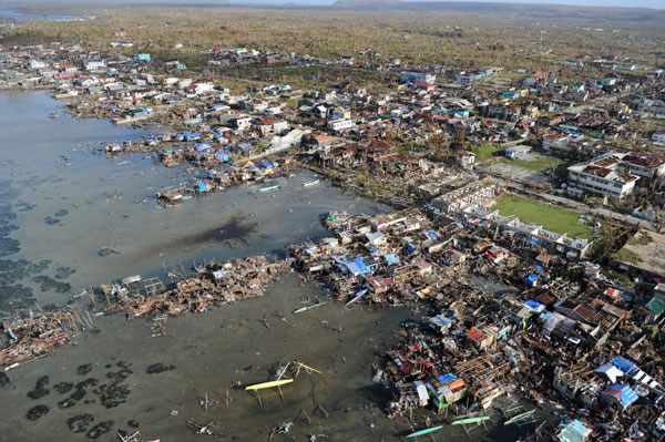 This aerial photo shows destroyed houses in the town of Guiuan in Eastern Samar province, central Philippines, on Monday, four days after devastating Typhoon Haiyan hit the country. Ted Aljibe / Agence France-Presse