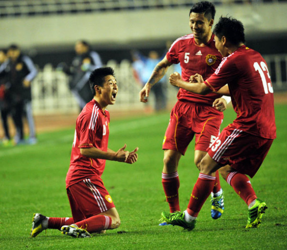 Wu Lei of China celebrates after scoring a goal against Indonesia in Xi'an city, Northwest China's Shaanxi province on Nov 15, 2013. [Photo/Asianewsphoto]