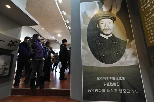 People visit the memorial hall of Ahn Jung-geun, who fought for the independence of the Korean Peninsula and shot dead Japan's first prime minister, Hirobumi Ito, in 1909. The hall was opened in Harbin, Heilongjiang province, on Sunday. Wang Song / Xinhua