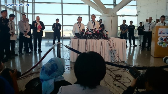 The news conference on the missing Malaysia Airlines Flight MH370 is held in Kuala Lumpur, Malaysia, March 25, 2014. (Xinhua/Wang Shen) 