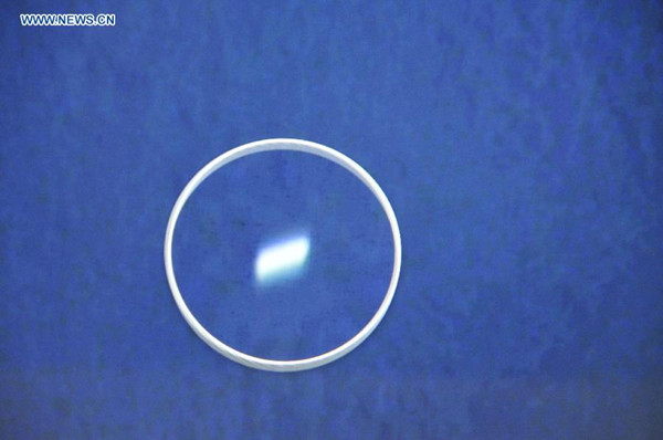 Photo taken on April 5, 2014 shows a piece of white floating object spotted by Chinese air force in the southern Indian Ocean. A Chinese air force plane searching for missing Malaysian passenger jet MH370 spotted a number of white floating objects in the search area Saturday. The plane photographed the objects over a period of 20 minutes after spotting them at 11:05 local time. (Xinhua/Huang Shubo) 