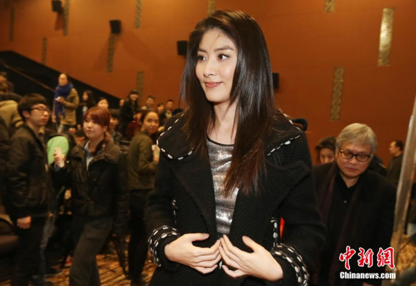  singer Kelly Chan attends a publicity campaign for a film in Nanjing on March 21, 2014. [Photo: China News Service / Yang Bo]