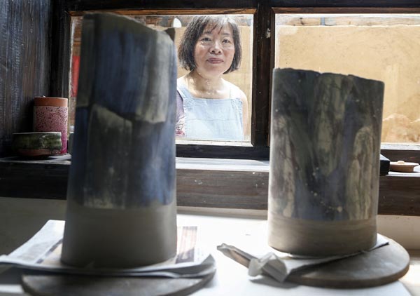 Yuk Kan Yeung is spending more than four weeks as artist in residence at the Sanbao Ceramic Art Institute in Jingdezhen. Zhang Hao / China Daily