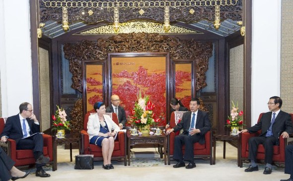 Chinese State Councilor Wang Yong (2nd R) meets with Baroness Lucy Neville-Rolfe, Parliamentary Under-Secretary of the Department for Business, Innovation and Skills of Britain, in Beijing, China, Sept. 3, 2014. (Xinhua/Wang Ye)