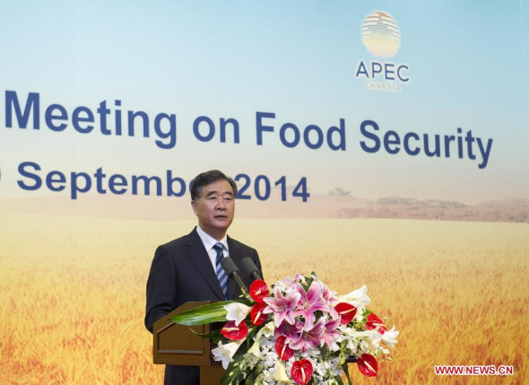 Chinese Vice Premier Wang Yang addresses the opening ceremony of the 3rd APEC Ministerial Meeting on Food Security in Beijing, capital of China, Sept. 19, 2014. (Xinhua/Wang Ye)