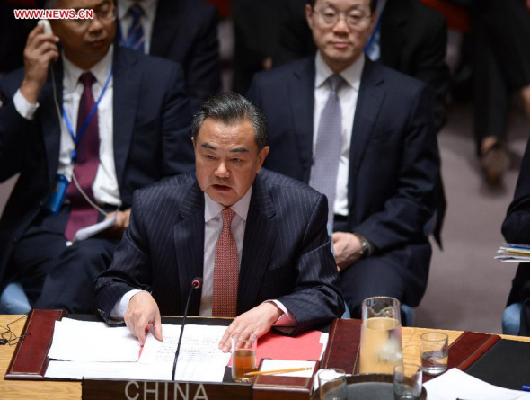 Chinese Foreign Minister Wang Yi attends a UN Security Council summit on terrorism in New York, Sept. 24, 2014. Wang Yi on Wednesday called on the international community to come up with new thinking and new steps in its response to terrorism. (Xinhua/Yin Bogu)