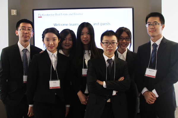 Students from Renmin University participated in the 6th Annual Cornell International Real Estate Case Competition in New York on Tuesday, where student teams from 17 universities were presented with a real estate problem and then given five days to come up with an analysis and solution. From left: Shen Yuan, Chen Yifan, Yi Fangxu, Yan Yingge, Xu Xin, Liu Liou, Li Jingyuan. Amy He / China Daily