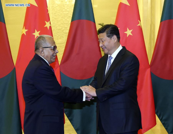 Chinese President Xi Jinping (R) meets with Bangladeshi President Abdul Hamid at the Great Hall of the People in Beijing, capital of China, Nov. 8, 2014. (Xinhua/Ding Lin)