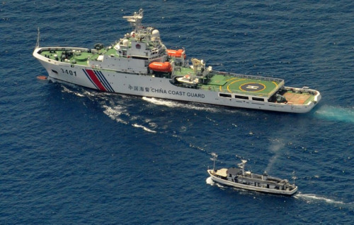 Philippine troop and Chinese maritime police boat confronted at Second Thomas Reef.