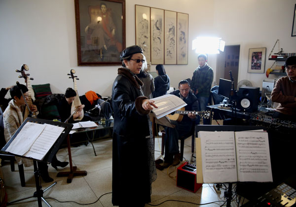 Liu Sola and her group rehearse for the upcoming show, Liu Sola&Friends Ensemble Concert, which will be held at the Forbidden City Concert Hall in Beijing on Saturday. [Photo by Jiang Dong/China Daily]  