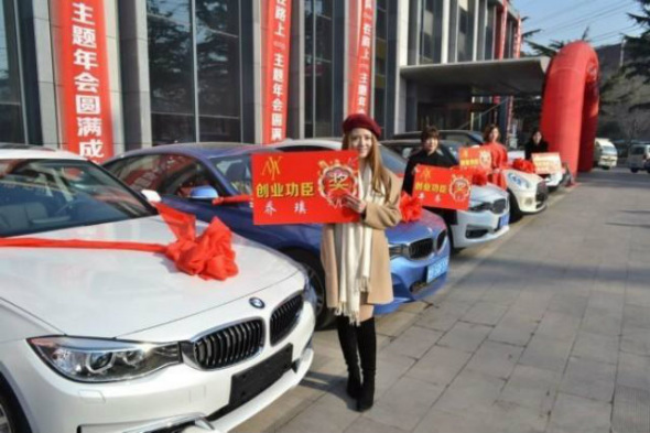 Boss gives away 4 BMWs to employees as bonus 